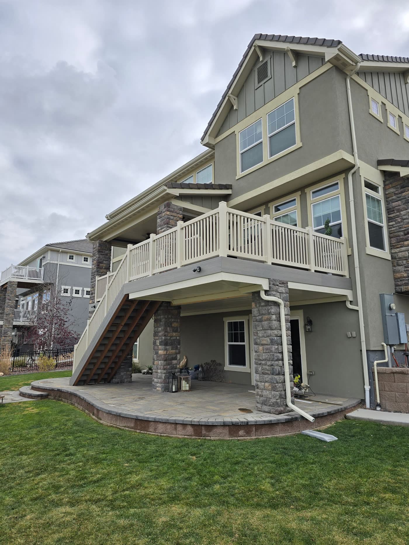 Two-level deck on the back of a three-storey home