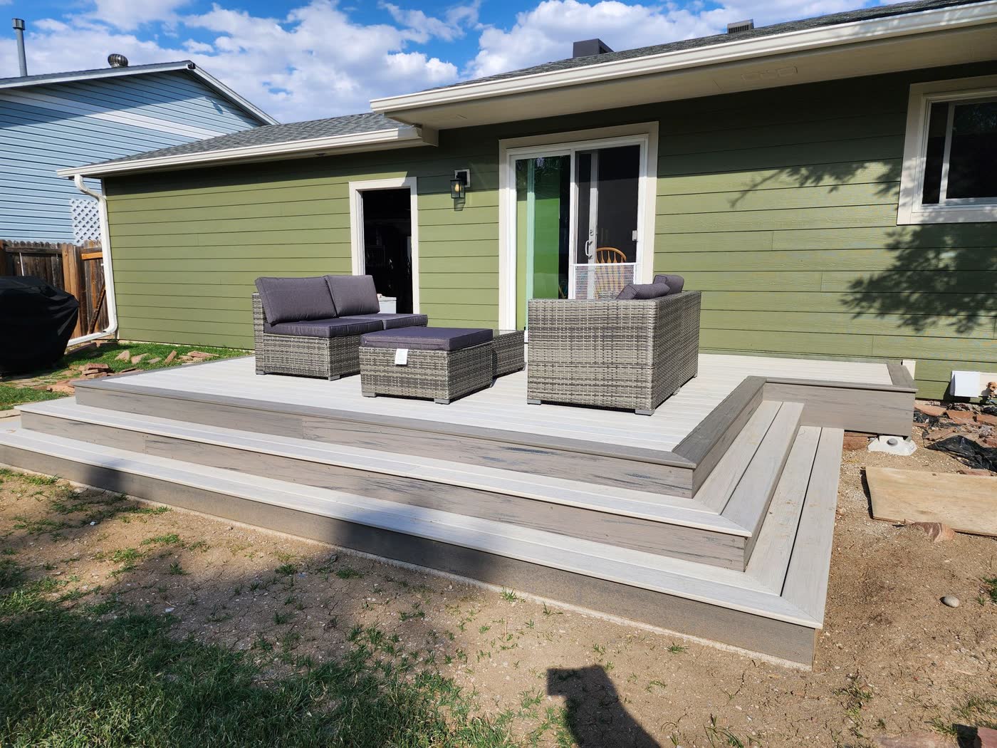 Composite deck with wide wraparound steps