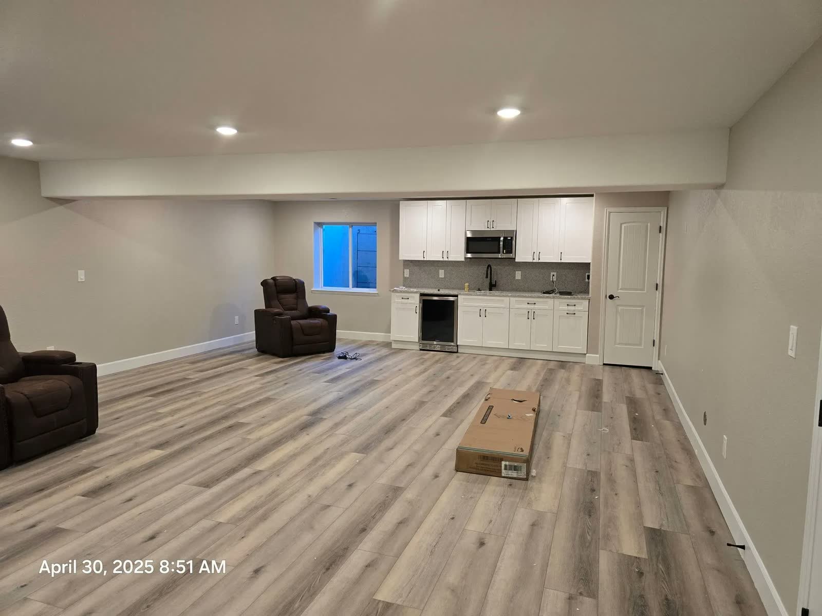 Open basement with kitchenette at the far end
