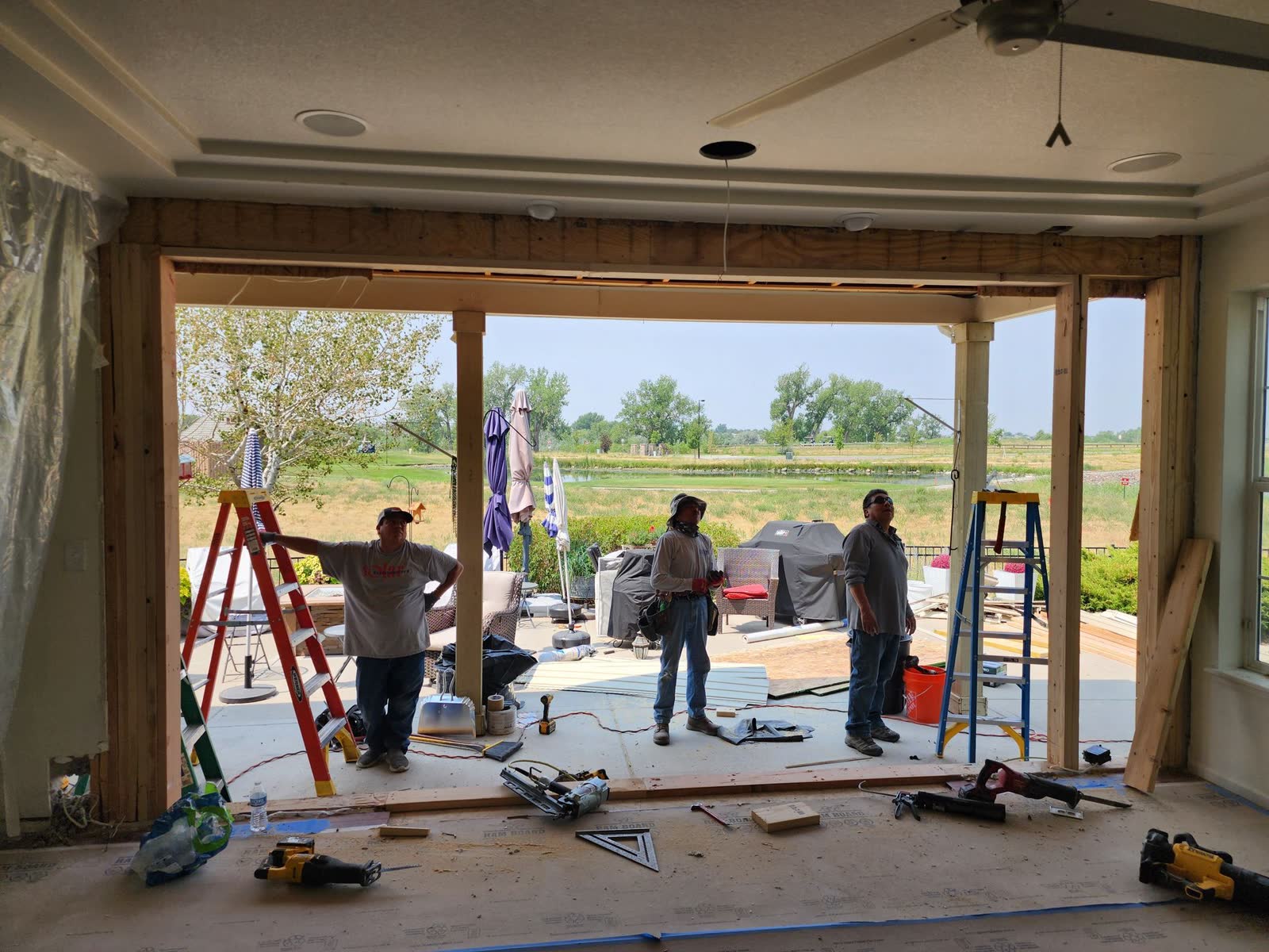 Crew framing a new window wall